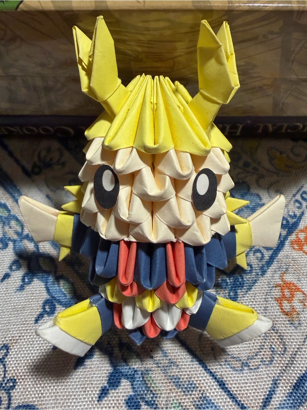 Preloved: 3D origami figure crafted using modular paper folding techniques.